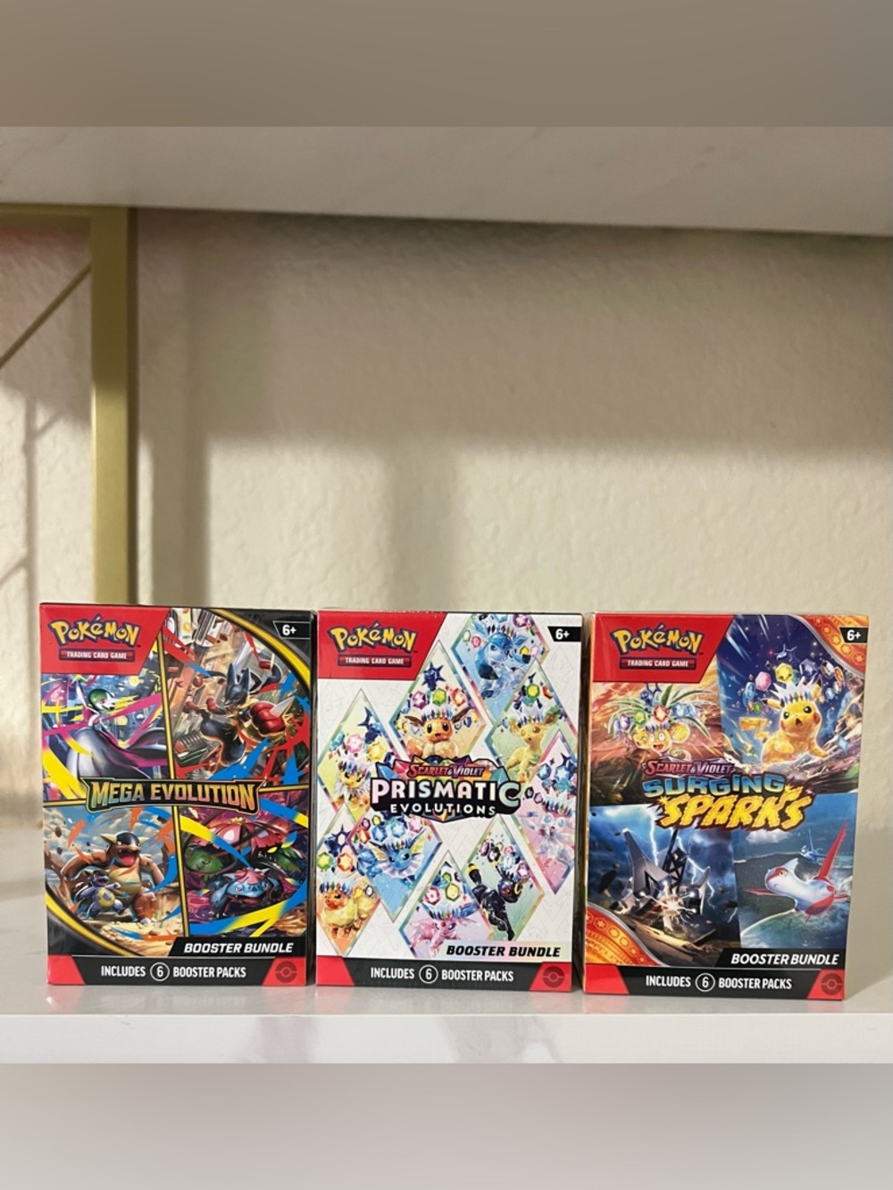 3pc Pokemon Booster Bundles Prismatic Evolutions, Mega Evolutions,Surging Sparks